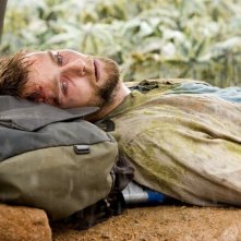 Joe Anderson in una scena del film Rovine