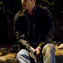 Keanu Reeves in una scena del film La notte non aspetta