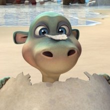 Il tenero dinosauro Impy esce dal guscio in una scena del film d'animazione Impy e il mistero dell'isola magica