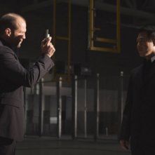 Jason Statham con Jet Li in una scena di Rogue - Il solitario
