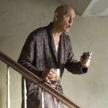 John Malkovich in una scena di Burn After Reading