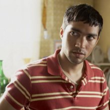 Christopher Simpson in una scena del film Brick Lane