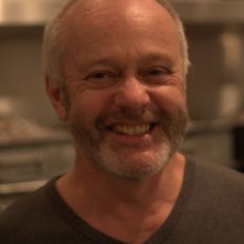 Il regista Michael Radford sul set del film Un colpo perfetto