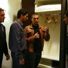 Simone Corrente, Enrico Silvestrin e Max Giusti in una scena di Distretto di Polizia 8