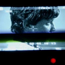 Marco Martini durante una scena del film IN THE MARKET visto attraverso il view-finder della camera