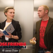 Un wallpaper del film How to Lose Friends and Alienate People con Kirsten Dunst e Simon Pegg