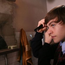 Alvaro Caleca in una scena del film Come Dio comanda