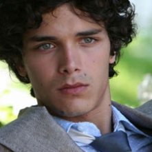 Un primo piano di Marco Rulli