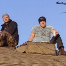 Tim McGraw e Jon Favreau in una scena della commedia Four Christmases