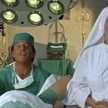 Liliana Dell'Aquila con Christian De Sica in una scena del film Tifosi, di Neri Parenti