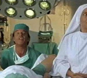 Liliana Dell'Aquila con Christian De Sica in una scena del film Tifosi, di Neri Parenti