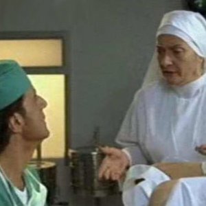 Liliana Dell'Aquila e Christian De Sica in una scena del film Tifosi, di Neri Parenti