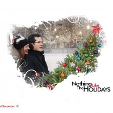 Un wallpaper di Nothing Like the Holidays con Debra Messing e John Leguizamo