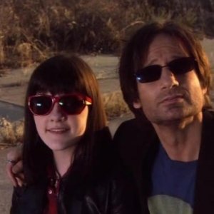Madeleine Martin e David Duchovny in una scena dell'episodio 'La petite mort' di Californication