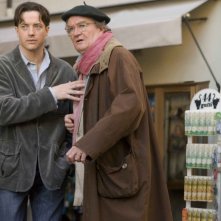 Brendan Fraser e Jim Broadbent in una scena del film Inkheart - La leggenda di cuore d'inchiostro