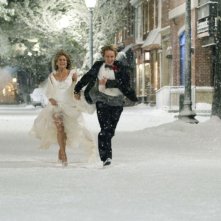 Jennifer Aniston e Owen Wilson sposi in una scena del film Io & Marley