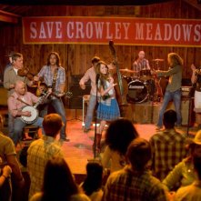 Rob Hajacos, Eric Silver, Marcel Changnon e Miley Cyrus in una scena del film Hannah Montana: The Movie