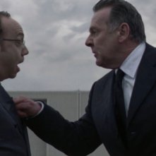 Paul Giamatti e Tom Wilkinson in una scena del film Duplicity
