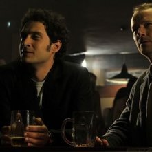 Claudio Santamaria e Iain Glen in una scena del film Il caso dell'infedele Klara