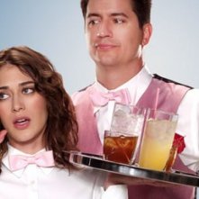 Ken Marino e Lizzy Caplan in una immagine promozionale di Party Down
