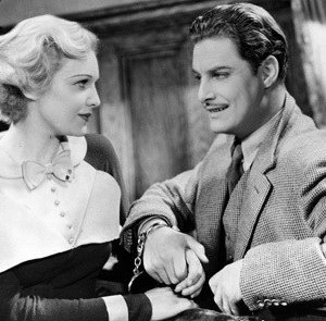 Robert Donat e Madeleine Carroll in una scena de Il club dei trentanove