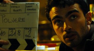 Primo Reggiani sul set del film Polvere