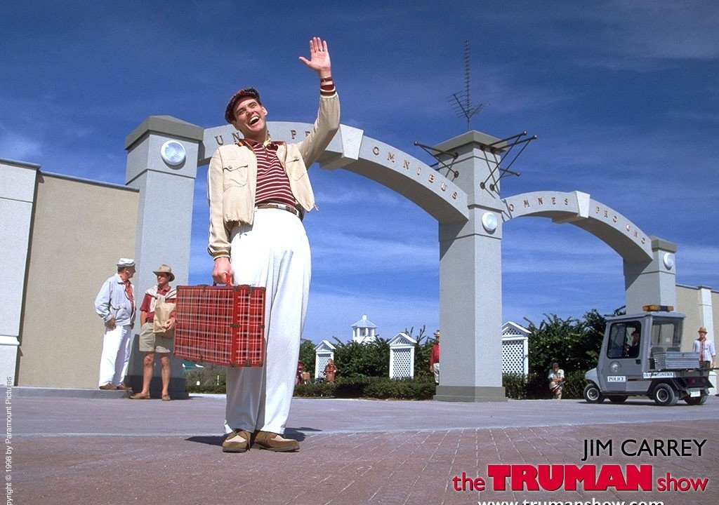 Jim Carrey mentre saluta in The Truman Show