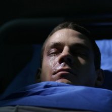 Henry Garrett in una sequenza del thriller Visions diretto da Luigi Cecinelli