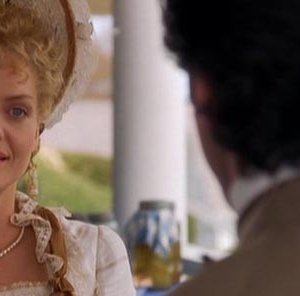 Daniel Day-Lewis (di spalle) con Michelle Pfeiffer in una sequenza del film L'età  dell'innocenza