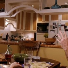 Lindsay Lohan e Neil Flynn in scena del film Mean Girls