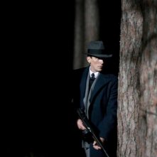 Christian Bale in un'immagine del film Nemico pubblico