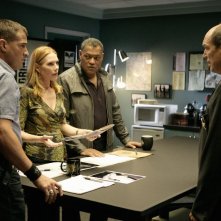 Marc Vann, Laurence Fishburne, Marg Helgenberger e George Eads in una scena dell'episodio Family Affair di CSI