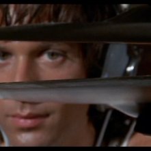 Michael Brandon in una scena del film Quattro mosche di velluto grigio (1971)