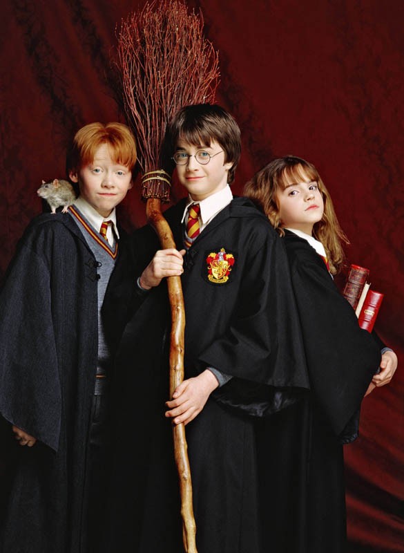 Rupert Grint, Daniel Radcliffe, Emma Watson e il topo Crosta per il film Harry Potter e la pietra filosofale