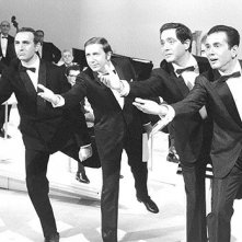 Quattro icone della tv italiana: Mike Bongiorno, Corrado, Pippo Baudo ed Enzo Tortora.