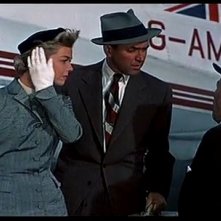 James Stewart con Doris Day in una sequenza del film L'uomo che saperva troppo (1956)