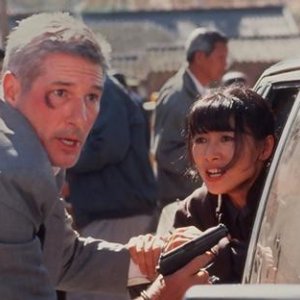 Richard Gere e Bai Ling in una scena de L'angolo rosso