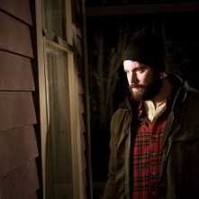 AJ Bowen in una scena del film horror The House of the Devil