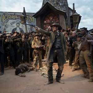 Melvil Poupaud è circondato in una scena del film Lucky Luke