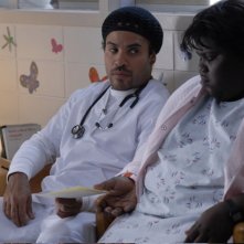 Gabourey Sidibe e Lenny Kravitz in una scena del film Precious