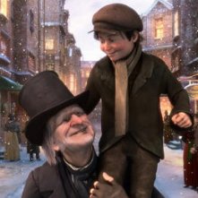 Scrooge e Tiny Tim nel film A Christmas Carol (2009)