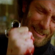 Paolo Malco in una scena del film Quella villa accanto al cimitero ( 1981 )