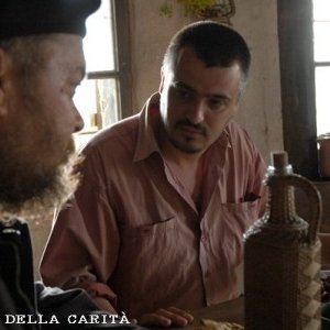 Ilir Jacellari in una scena del film tv L'uomo della carità - Don Luigi di Liegro.