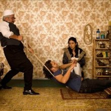 Adam Bousdoukos e Dorka Gryllus  in una scena divertente del film Soul Kitchen