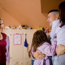 Natalie Portman, Taylor Geare, Tobey Maguire e Bailee Madison in una sequenza di Brothers