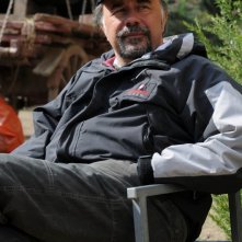 Un'immagine del regista Giorgio Diritti sul set del film L'uomo che verrà