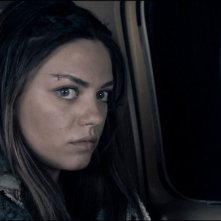 Mila Kunis in una sequenza del film Codice Genesi