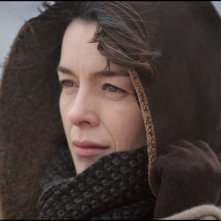 Un primo piano di Olivia Williams in una scena del film L'uomo nell'ombra di Roman Polanski.