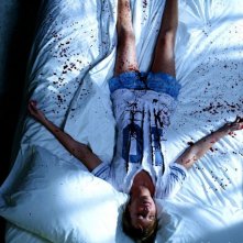 Katie Cassidy in un'insanguinata sequenza del film Nightmare