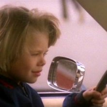 Il piccolo Giovanni Frezza in una scena del film Quella villa accanto al cimitero (1981)